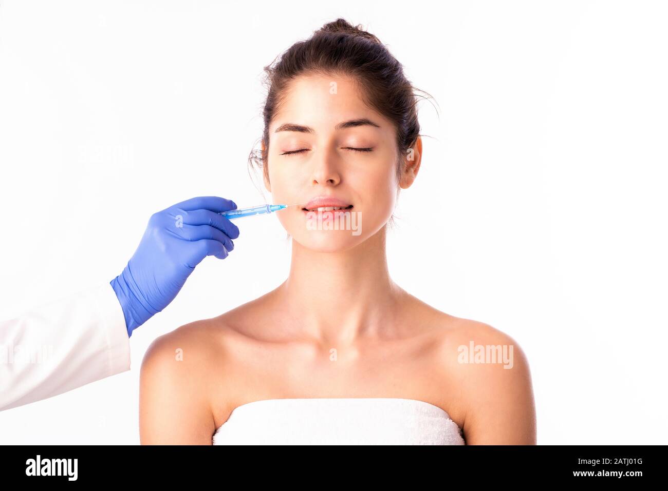 Woman receiving injection Cut Out Stock Images & Pictures - Alamy