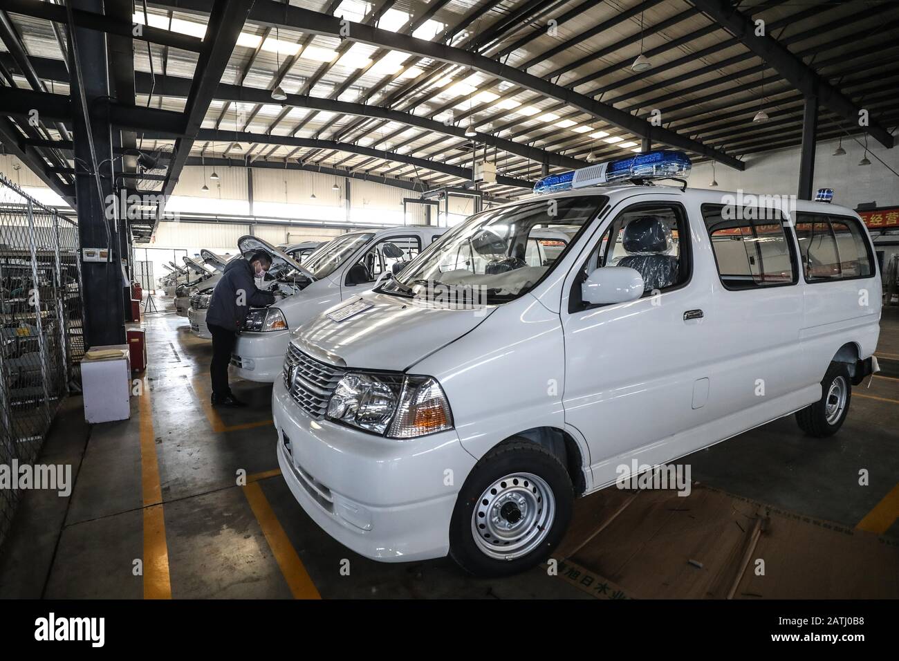 Shenyang, China's Liaoning Province. 3rd Feb, 2020. A worker produces ambulance at the manufacturing base of the Brilliance Auto company in Shenyang, northeast China's Liaoning Province, Feb. 3, 2020. In recent days, the company has rushed to produce negative pressure ambulances for the fight against the novel coronavirus epidemic. The production of the first batch of 10 negative pressure ambulances will be completed on Feb. 5 and then put into use. Credit: Pan Yulong/Xinhua/Alamy Live News Stock Photo