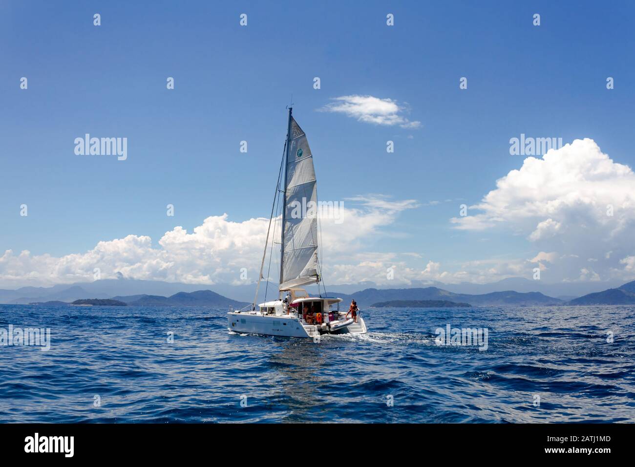 Angra dos Reis, Rio de Janeiro, December 31, 2019: Sailing Boat in Angra dos Reis bay area during the summer time. People sail around the islands in s Stock Photo