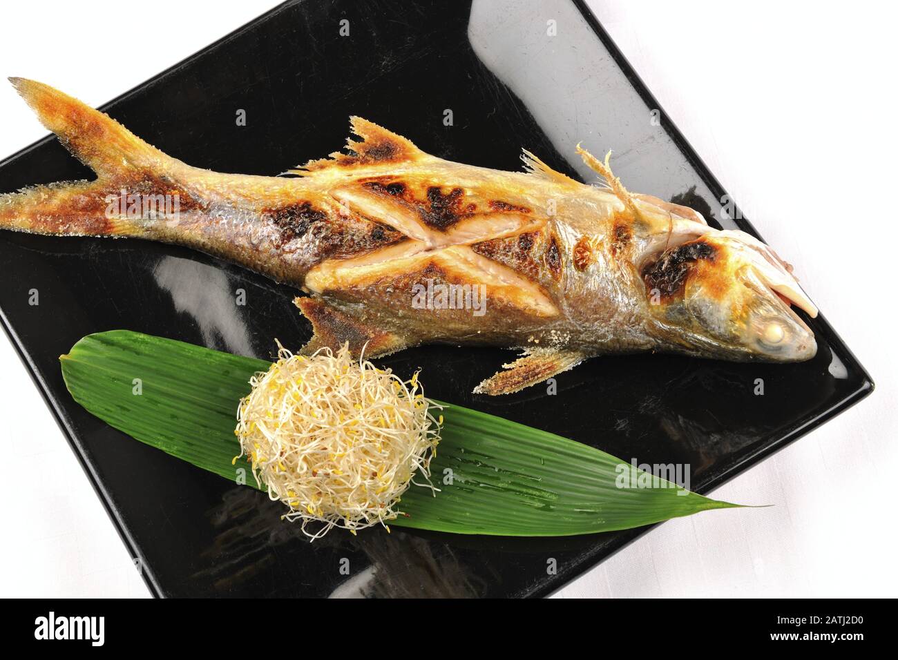 Food portrait of roast fish Stock Photo