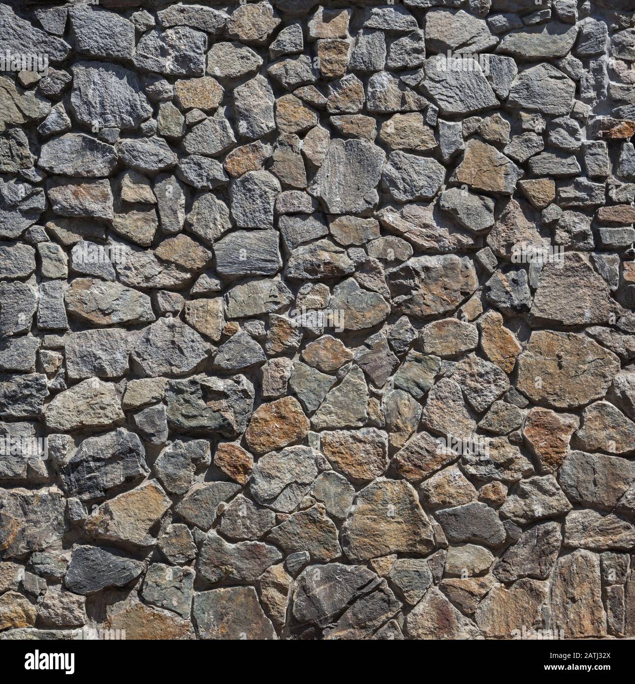 Stonewall, wall decorated with natural stone, close-up Stock Photo