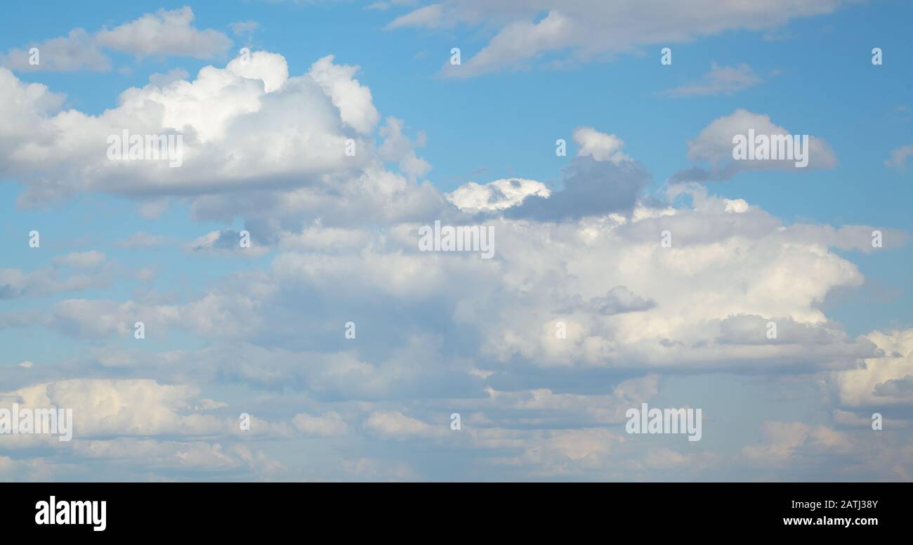 Blue sky with clouds, natural background Stock Photo - Alamy