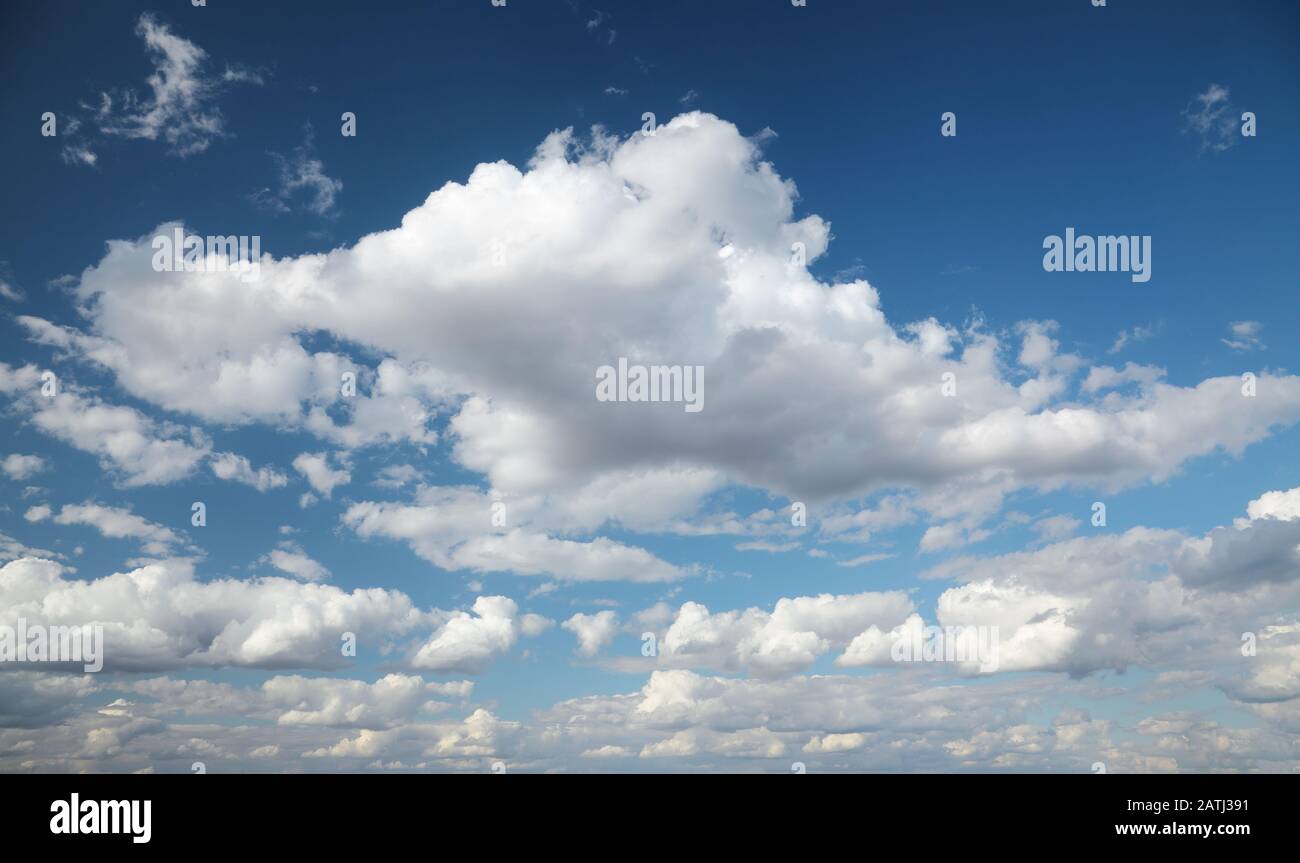 Blue sky with clouds, natural background Stock Photo - Alamy