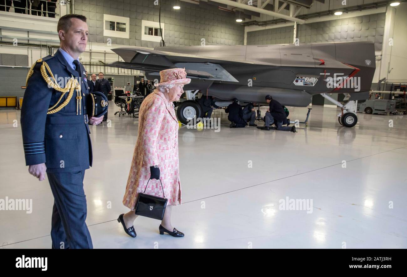 Queen Elizabeth II, with Station commander Group Captain James Beck during a visit to Royal Air Force Marham, Norfolk. Stock Photo
