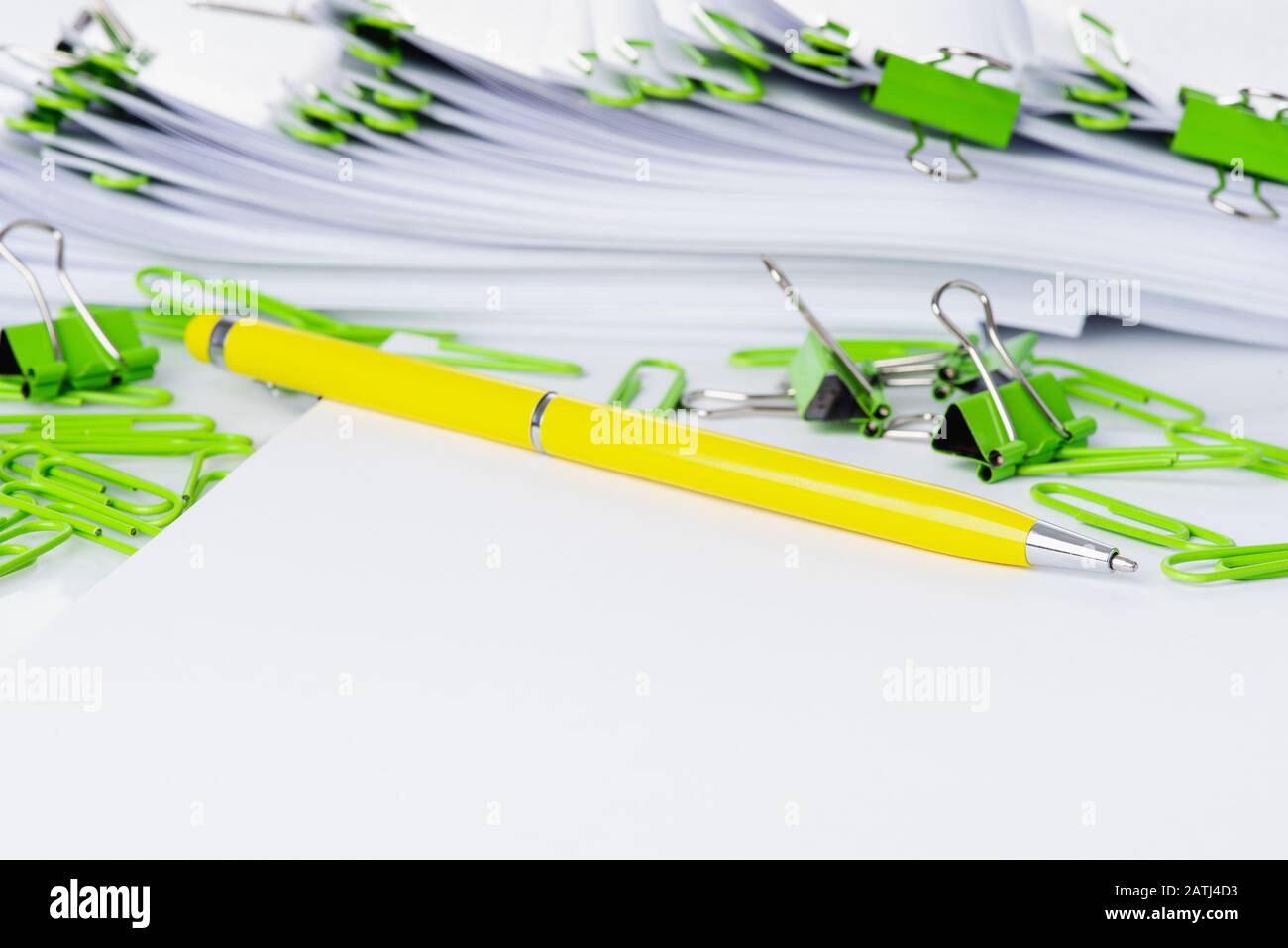 Blank paper sheet with pen and clip papers ready to make office job