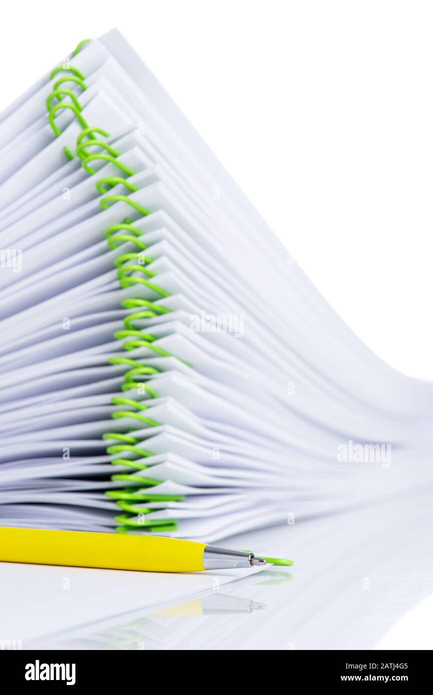 Stack of clipped blank paper sheet with pen ready to make note Stock Photo