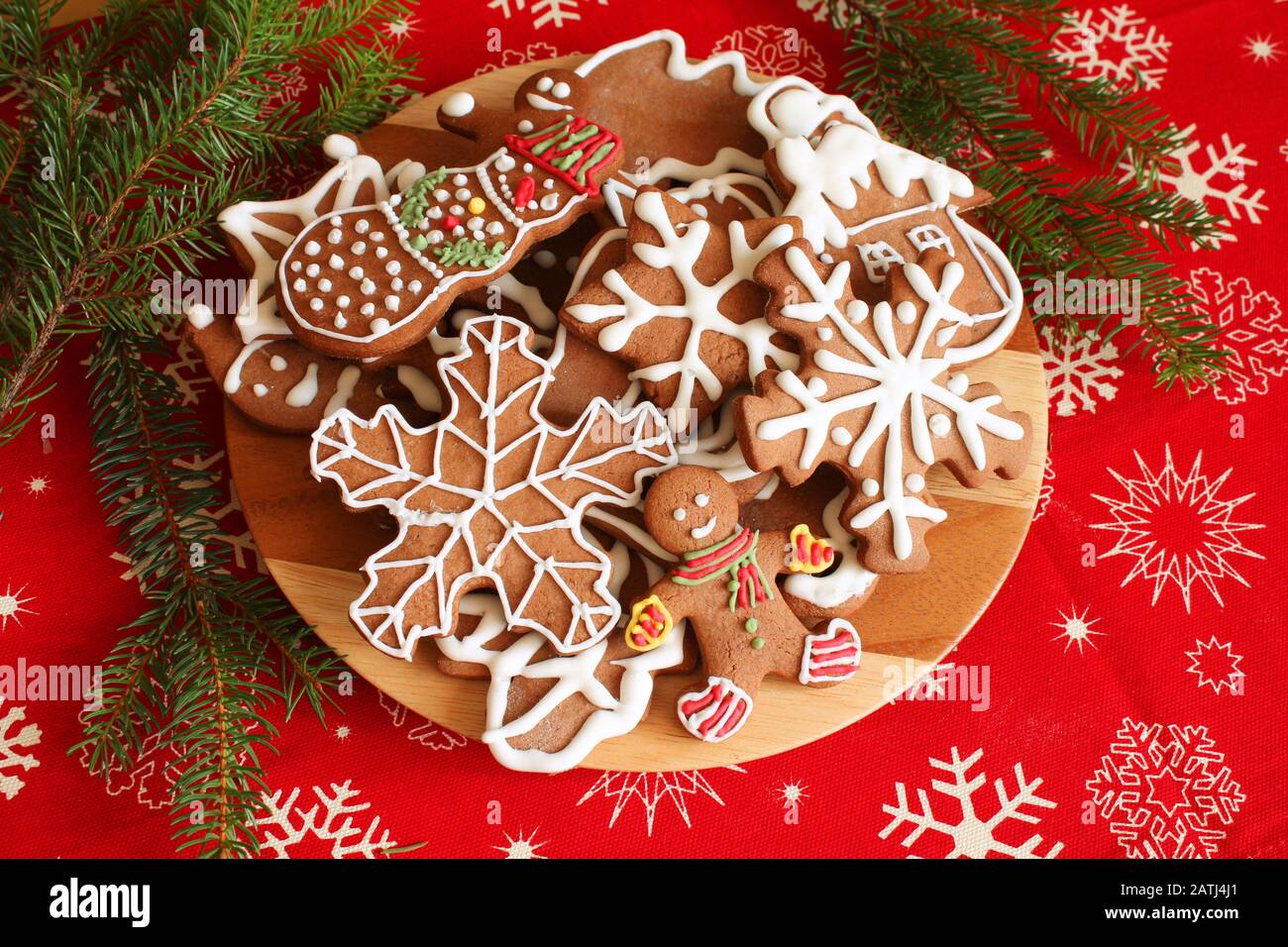 Christmas gingerbread cookies plate on decorated table Stock Photo