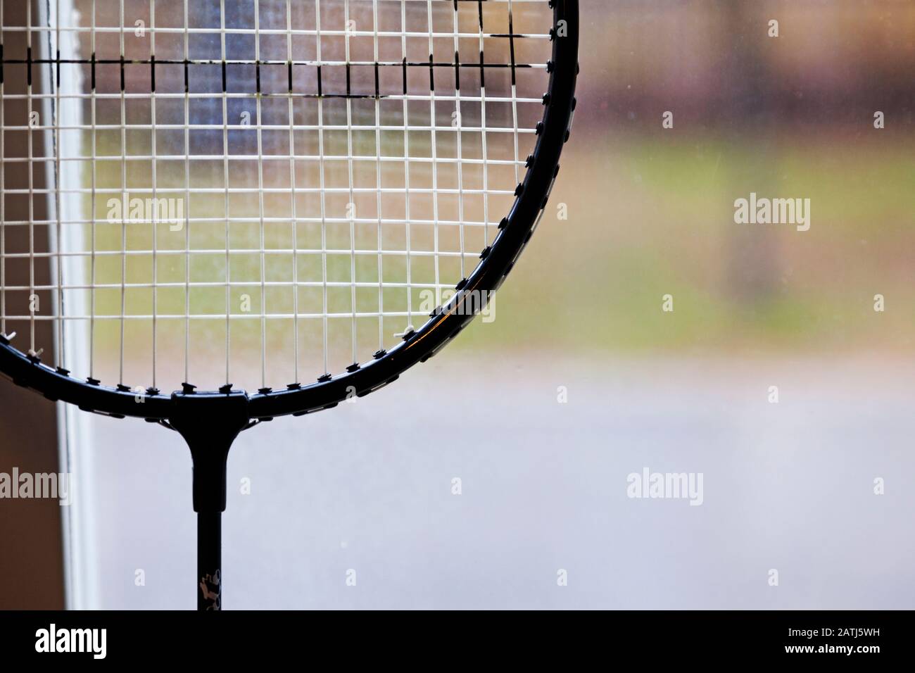 badminton racket standing in the window with blurry background Stock ...