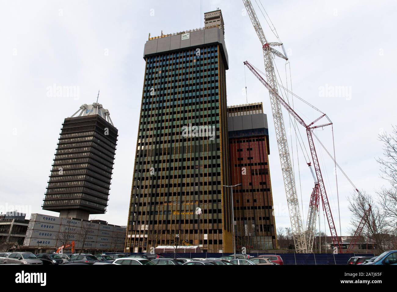 the building of the Deutsche Welle (public international broadcaster), which is in demolition, left behind the high-rise building of the Deutschlandfu Stock Photo