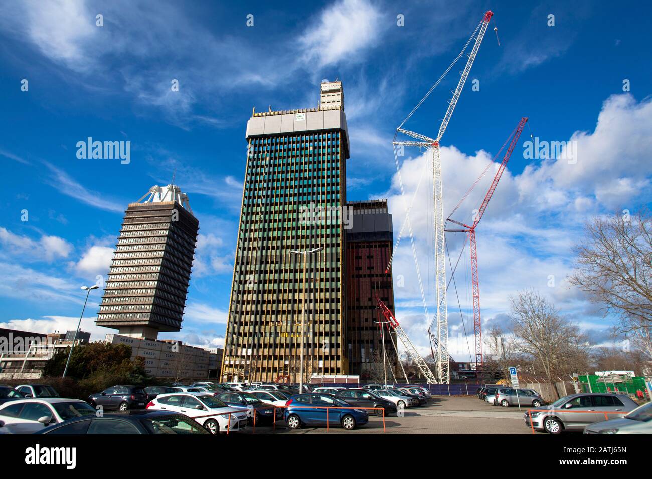 the building of the Deutsche Welle (public international broadcaster), which is in demolition, left behind the high-rise building of the Deutschlandfu Stock Photo