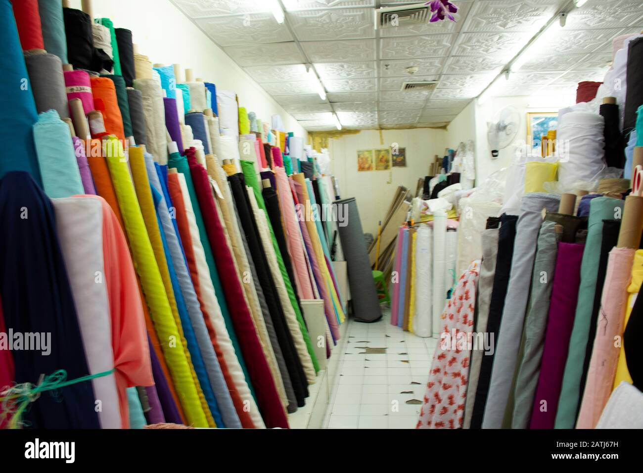 BANGKOK, THAILAND - DECEMBER 3 :Thai people walking select and buying fabric material with accessories from garment shop in India Emporium at Phahurat Stock Photo