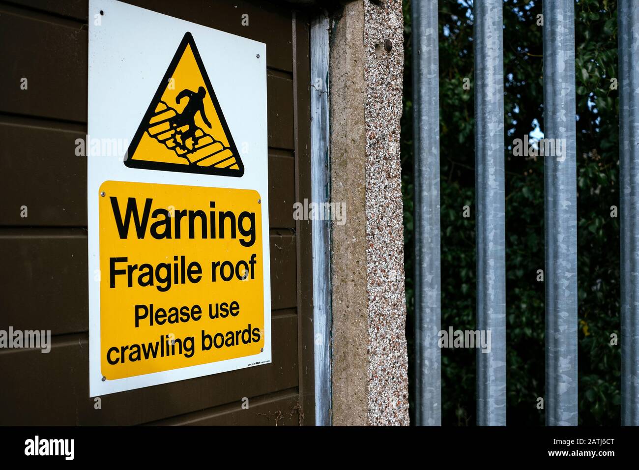 Fragile roof sign on a garage in Northampton Stock Photo
