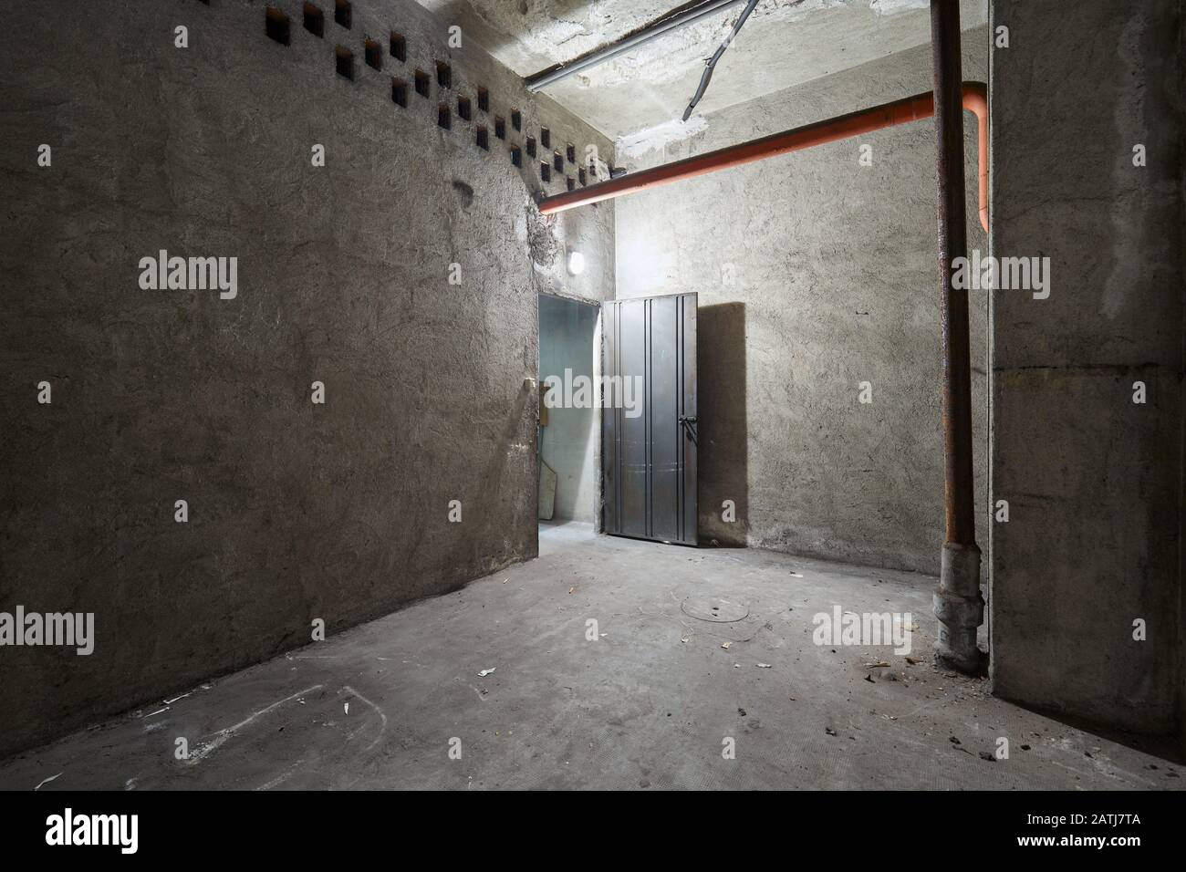 Empty basement interior with concrete walls Stock Photo