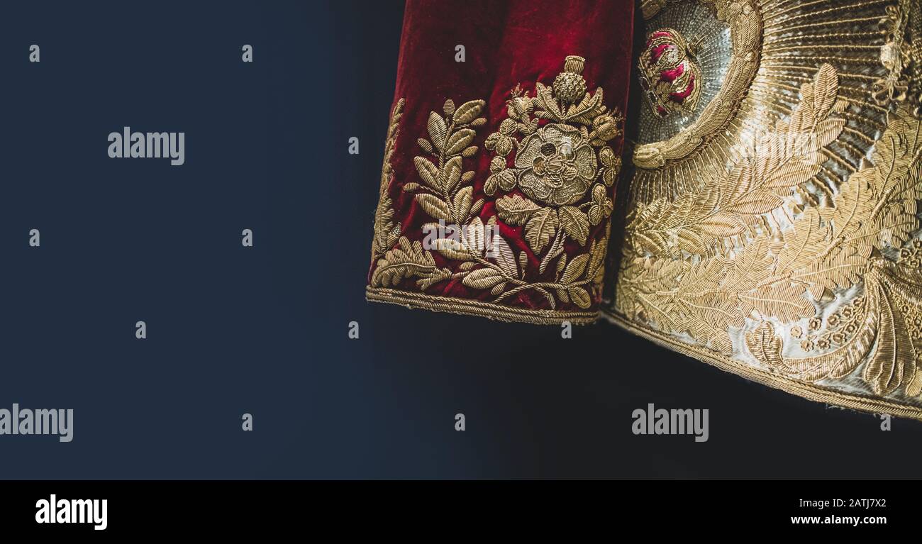 Detail of George IV Ceremonial Coronation robes showing the intricate embroidery, on display at The Queens Gallery, Buckingham Palace, London. Stock Photo