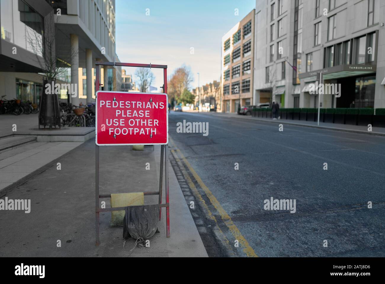 Notice on the pavement outside the modern office block at 50/60 Station road, Cambridge, England. Stock Photo