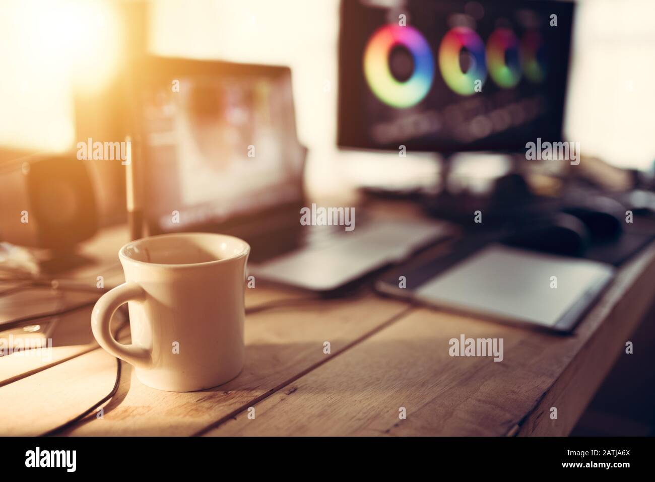 Editor desk coffee cup and laptop and monitor preview use for freelance  work in the house studio this is lifestyles of the vlog or blogger Stock  Photo - Alamy