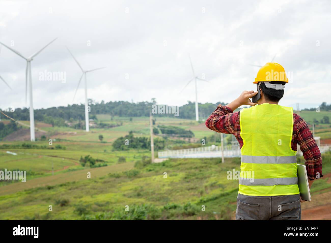 Engineering uses the mobile  report to the office Stock Photo