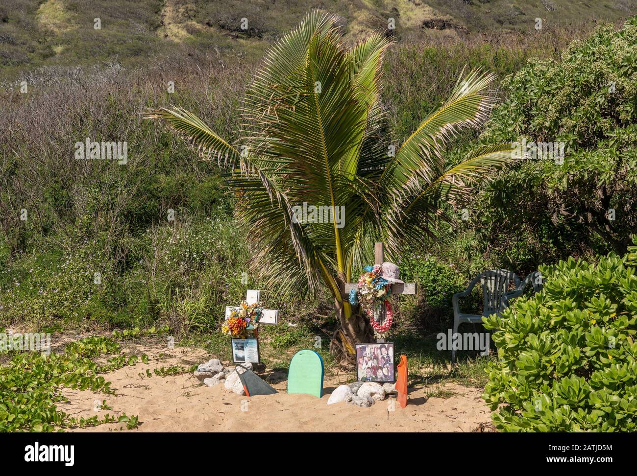 Waikiki, HI - 23 January 2020: Memorial crosses on Sandy Beach on Oahu to drowned body surfer Stock Photo