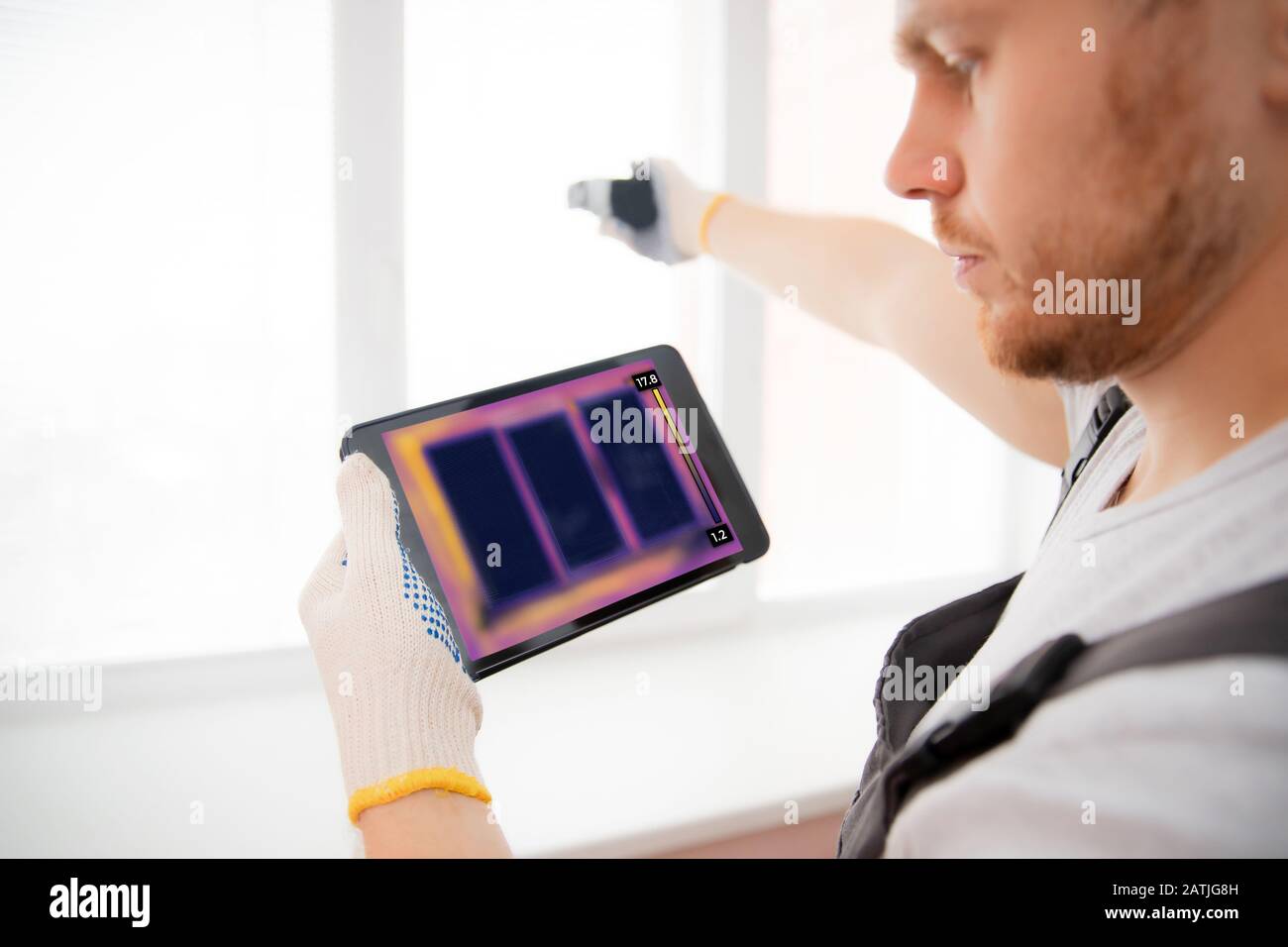 Master analysis thermal image of heat leak through upvc window Stock