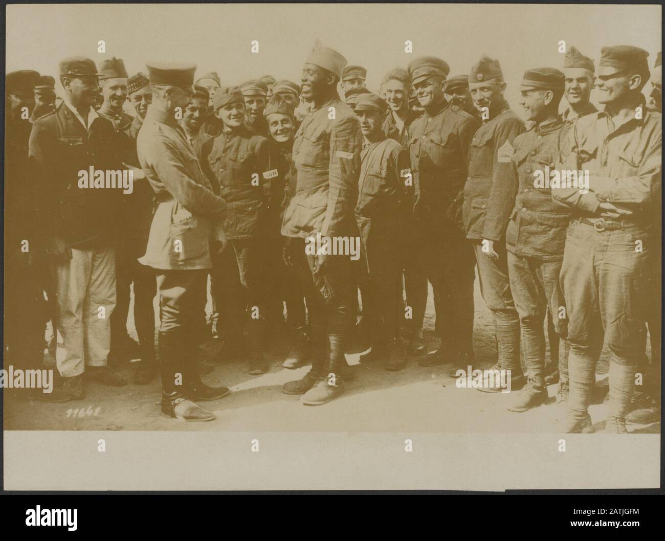 Description: In a German prison camp for Americans: German officers with a captured American Date: {1914-1918} Keywords: WWI, prisoner of war, soldiers Stock Photo