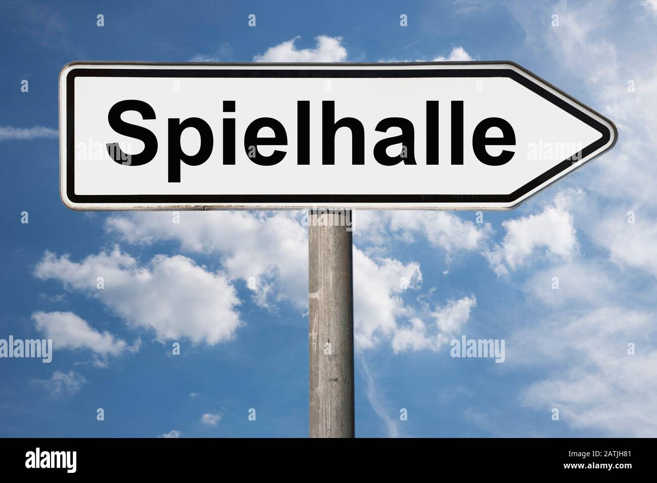 Detail photo of a signpost with the inscription Spielhalle (Amusement arcade) Stock Photo