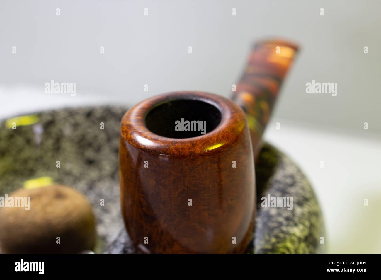Macro picture red-brown pipe on an ashtray Stock Photo