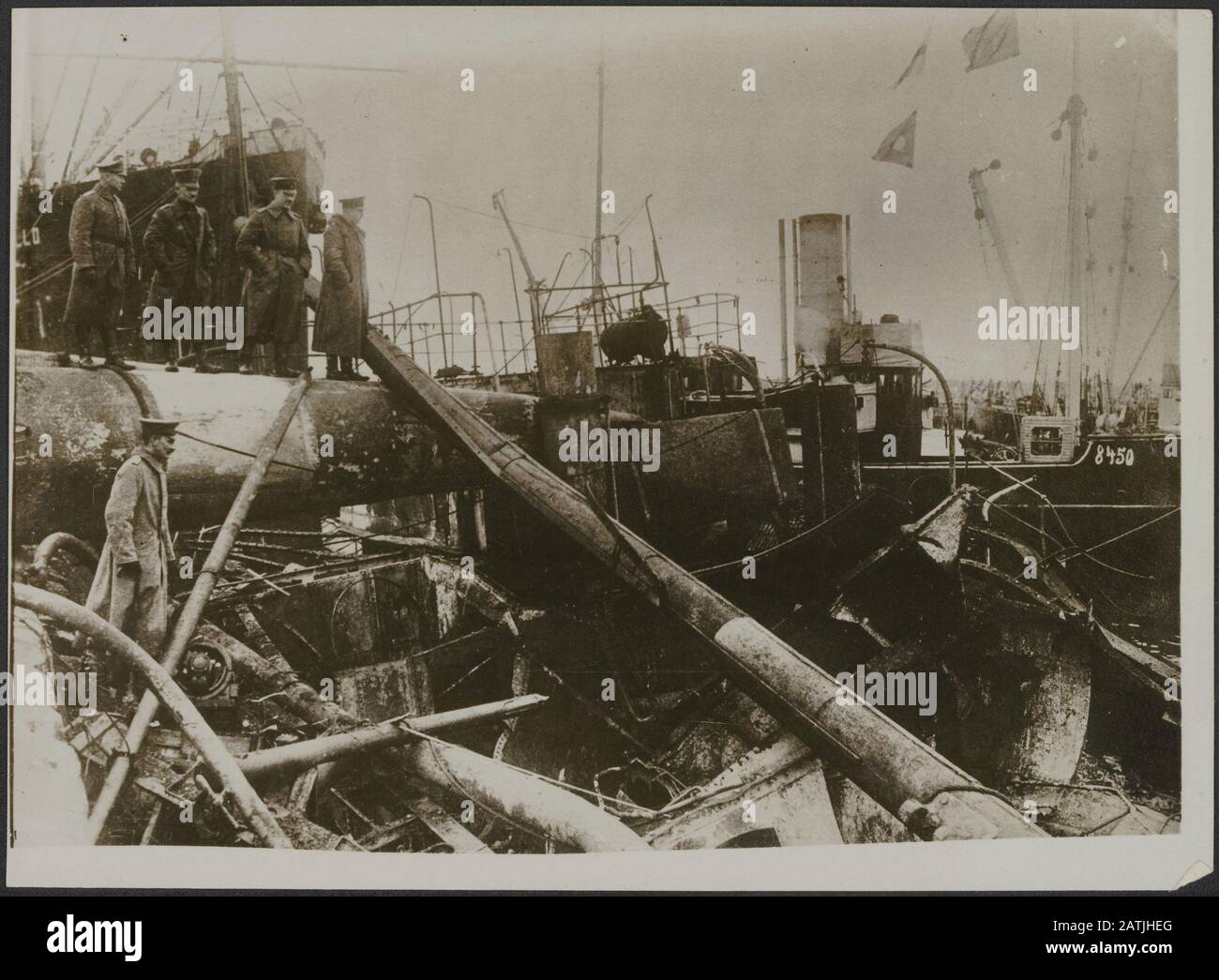 Destroy Ship Example Description: Soldiers look at a destroyed ship. Date: {1914-1918 ...