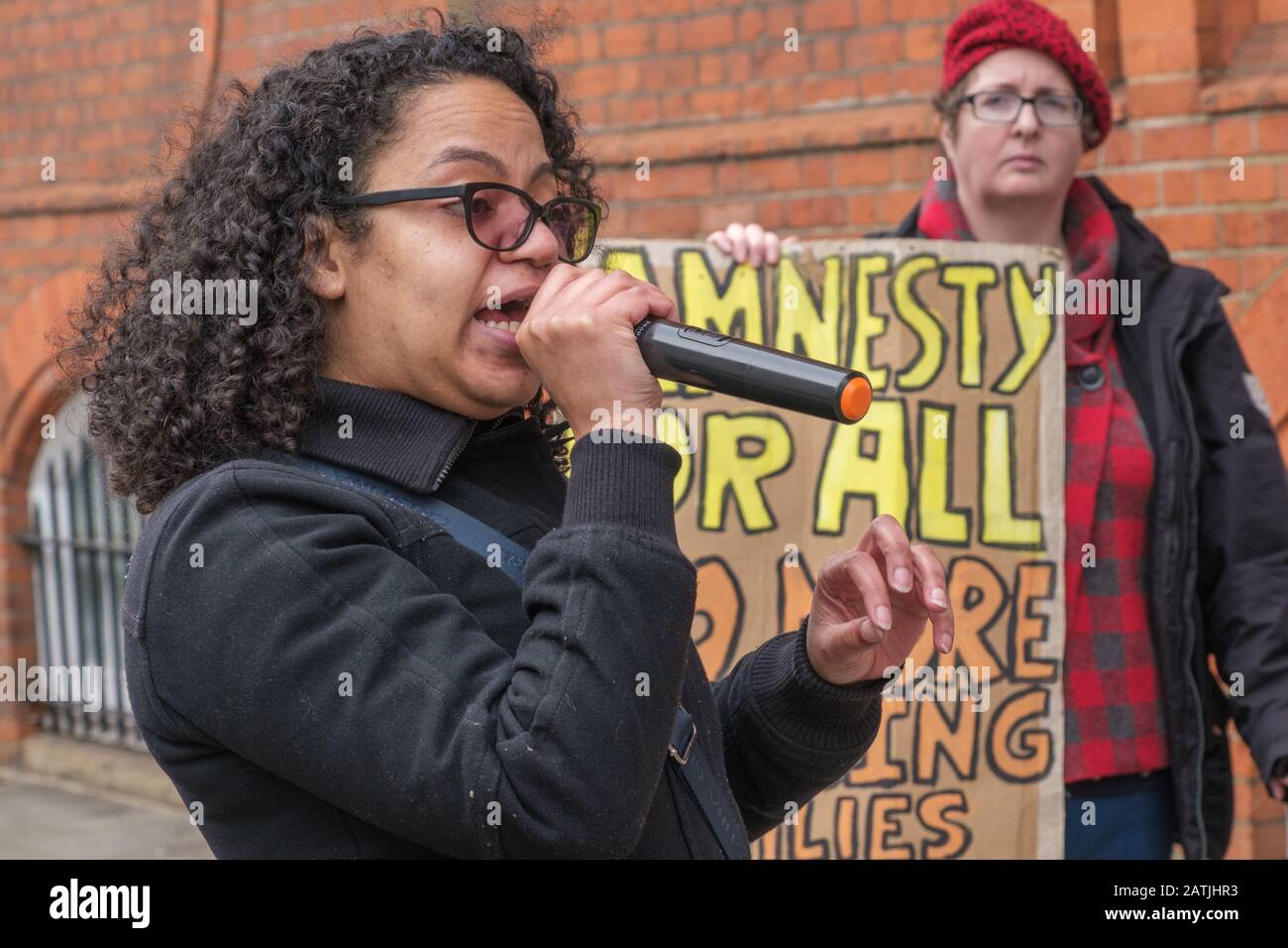 London, UK. 3rd February 2020. Antonia Bright of Movement for Justice speaks at a protest outside the Jamaican High Commission demanding Jamaica end accepting Britain's racist deportation flights. They say these are a modern equivalent of slave ships, with deportees manacled between guards for the flight. Those seized include many from Windrush families who have lived here most of their lives but are unable to produce the exhaustive paperwork demanded and seldom have the chance to properly contest their case. Peter Marshall/Alamy Live News Stock Photo