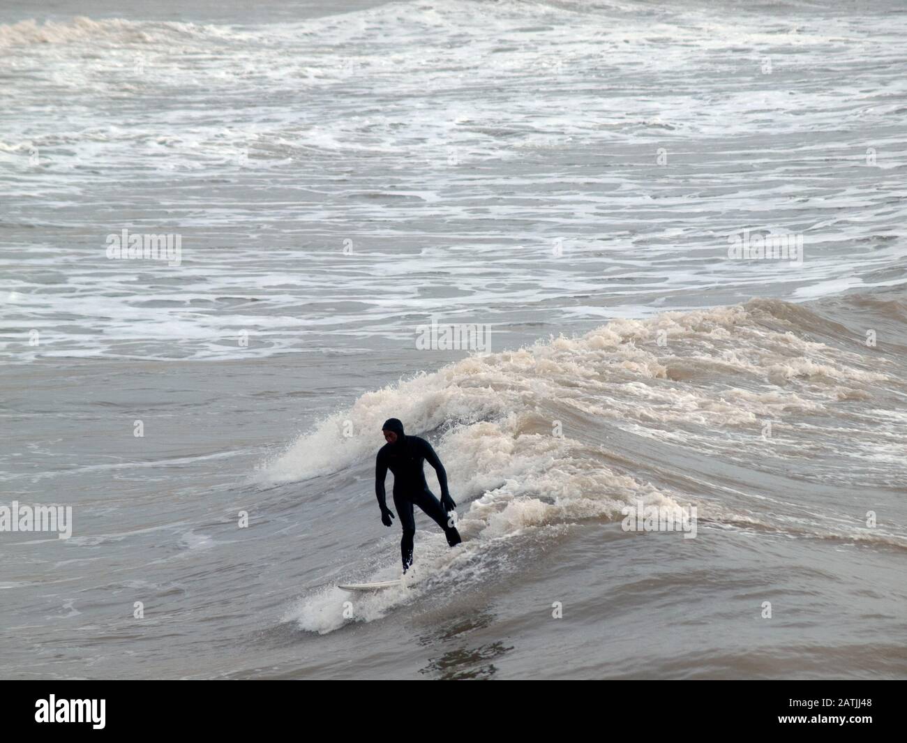 Black man surfing wave hi-res stock photography and images - Alamy