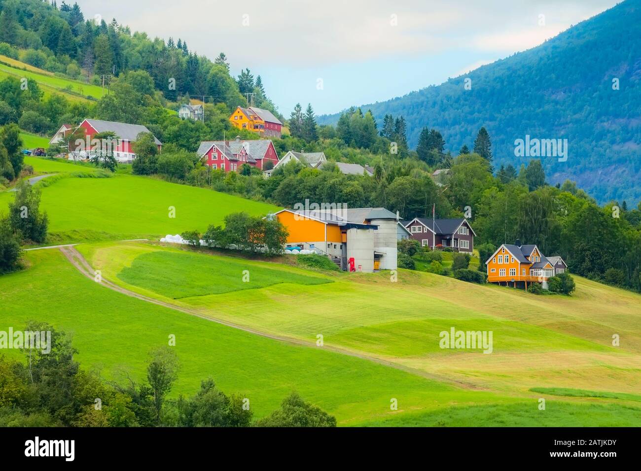 Norwegian village landscape, mountains and colorful traditional houses