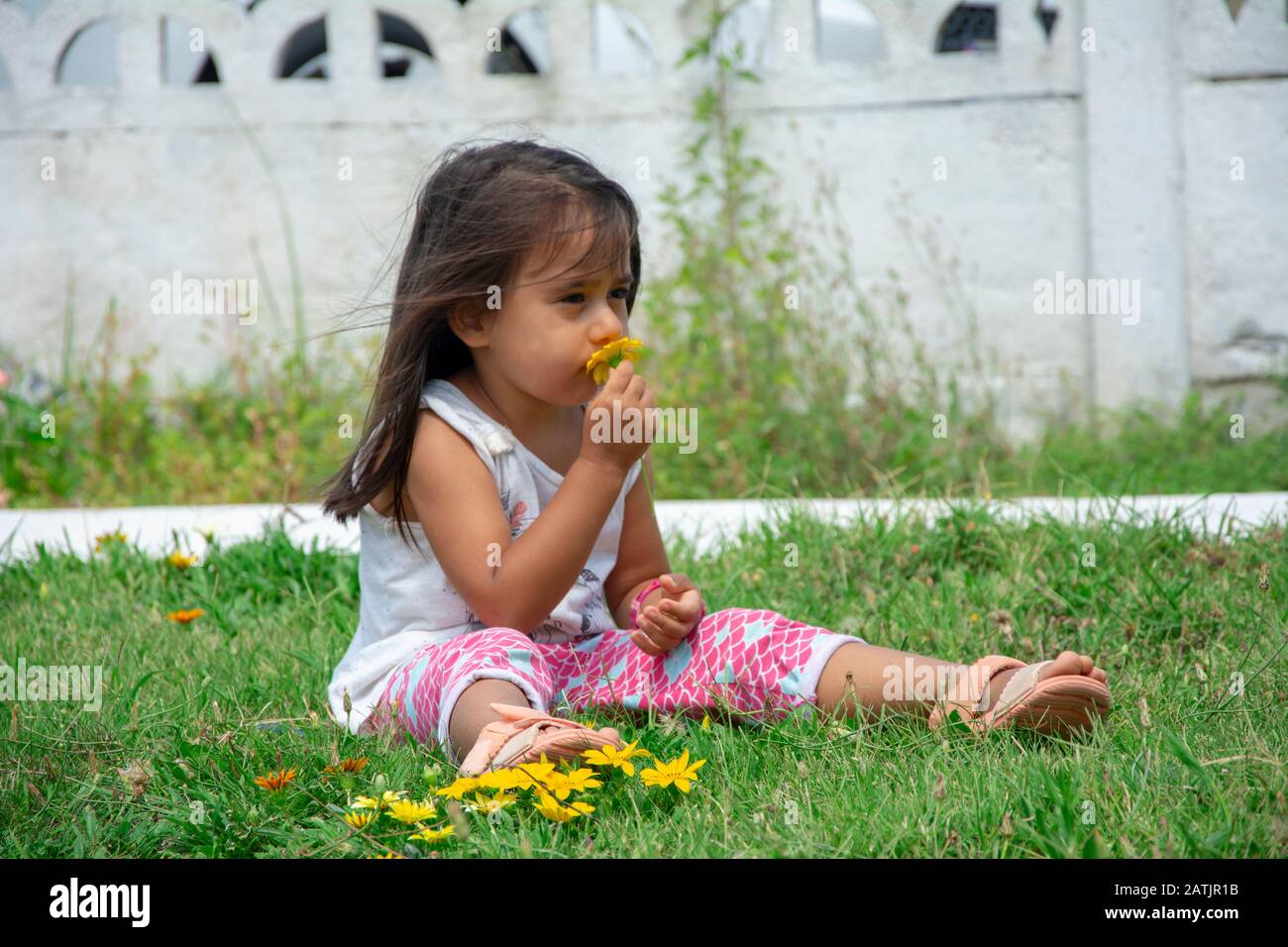 Sad girl sitting grass hi-res stock photography and images - Alamy