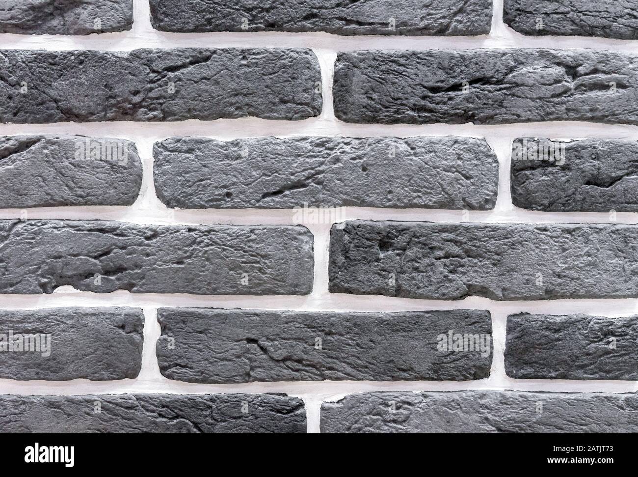 Brick wall from of gray and white bricks. Background and texture of