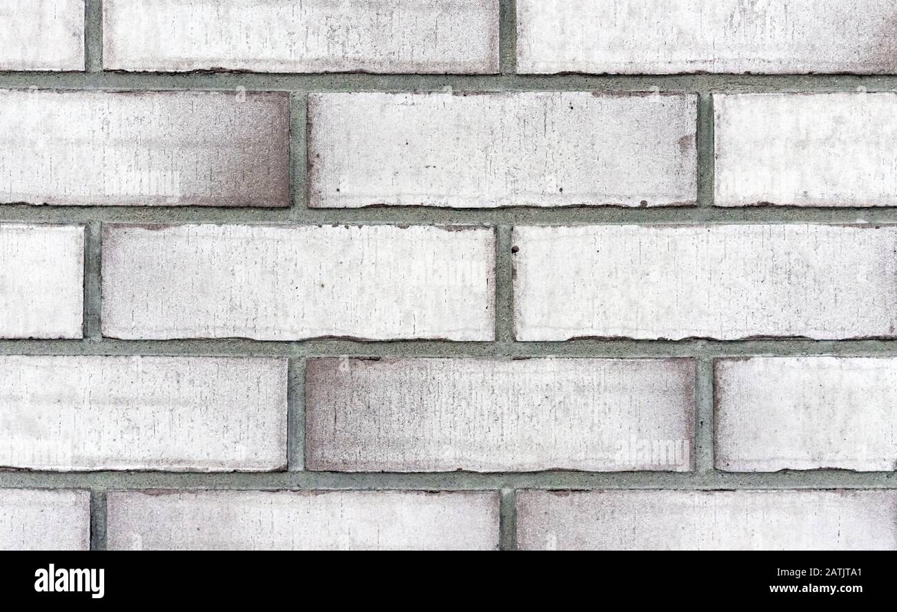 Brick wall from of white bricks. Background and texture of brickwork. Stock Photo
