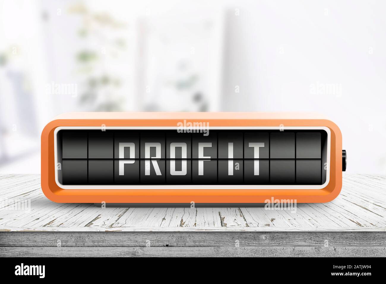 Profit message on a retro alarm device in a bright environment on a table Stock Photo