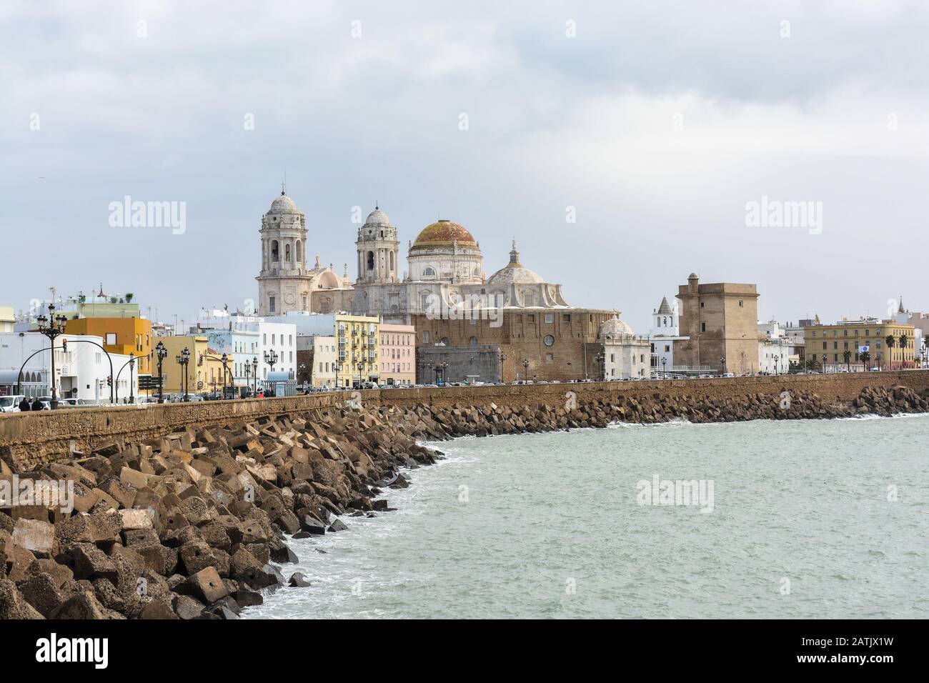 Promenade and Cathedral of Santa Cruz in Cadiz, Spain. A city in the south of Spanish Andalusia, on the shores of the Atlantic Ocean. Stock Photo