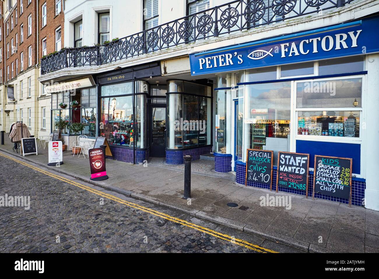 The harbour cafe and the fish and chip shop near the seafront at