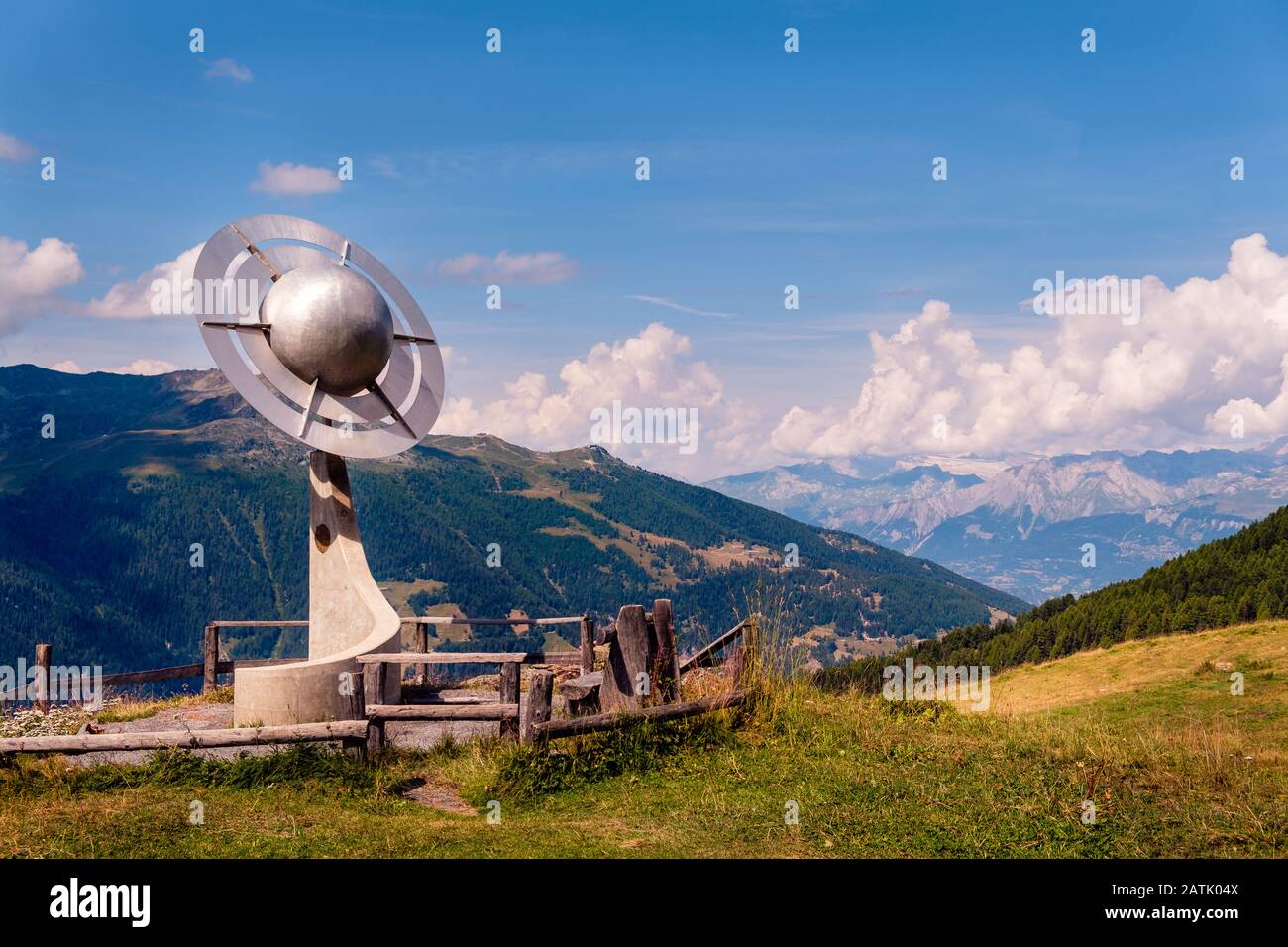 Saint-Luc, Valais, Switzerland - August 8 2018: Planet Saturn statue high up in the Pennine Alps on the Planets Trail on a sunny day in the summer Stock Photo