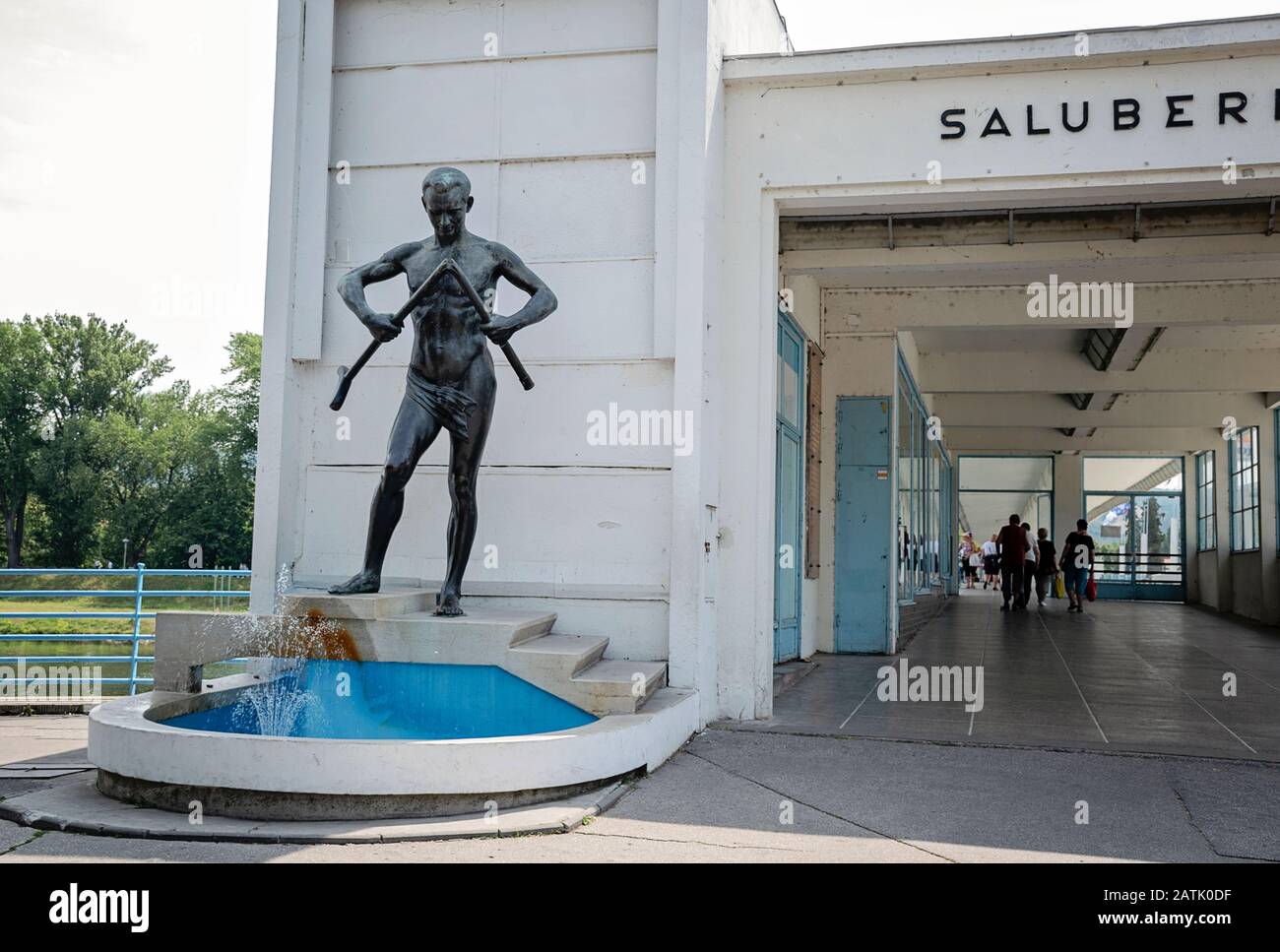 Piestany, Slovakia - July 20th, 2019: Crutch breaker statue in an entrance to The Colonnade bridge in centre of town. Famous spa. Symbol of spa town Stock Photo
