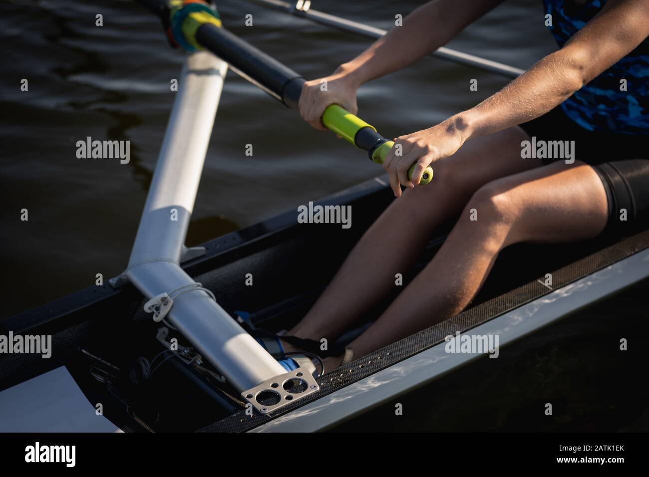 Female rowing team training on a river Stock Photo Alamy