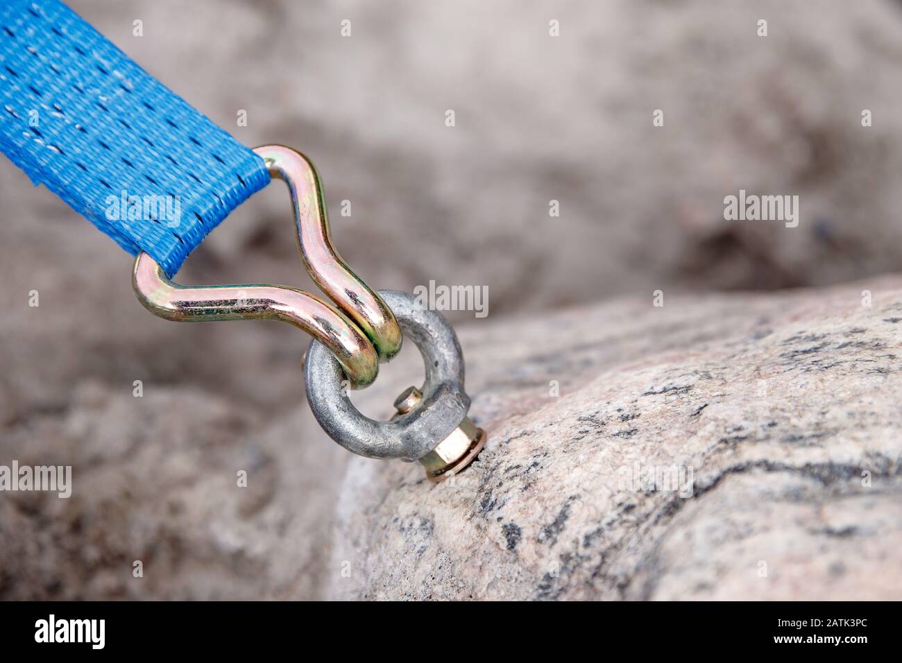 Bolt fastening slings rock climbing into stone Stock Photo