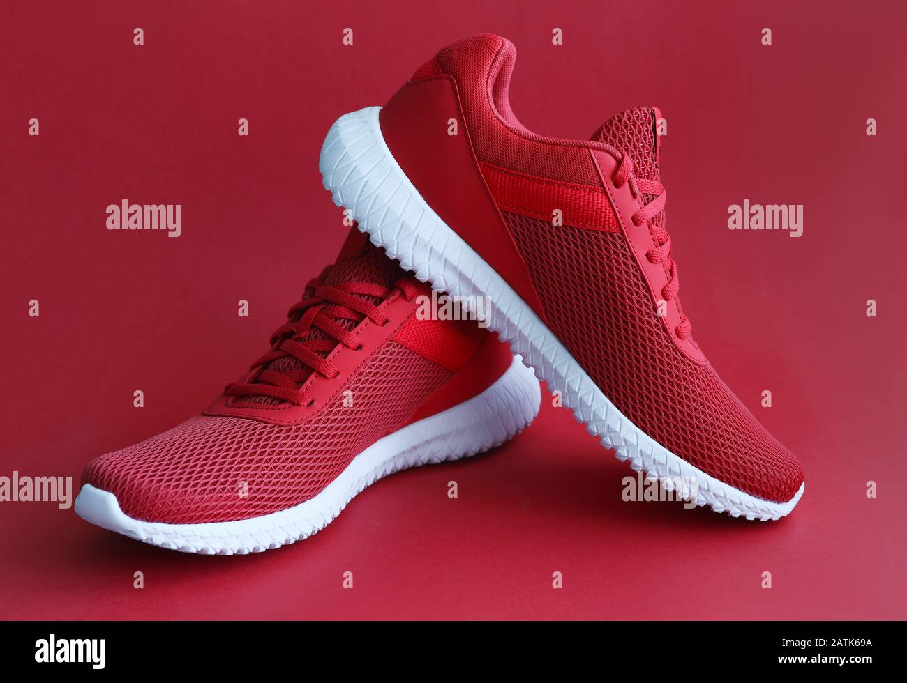 Colorful sport shoes on mustard color backround Stock Photo Alamy