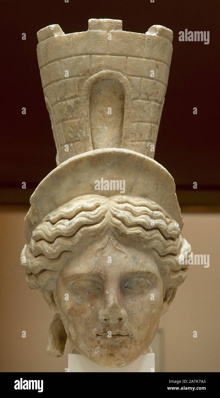 Colossal head of Tyche. 2nd century AD. Roman. Marble. From Italica (Sevilla province, Andalusia, Spain). Archaeological Museum of Seville. Andalusia, Spain. Stock Photo