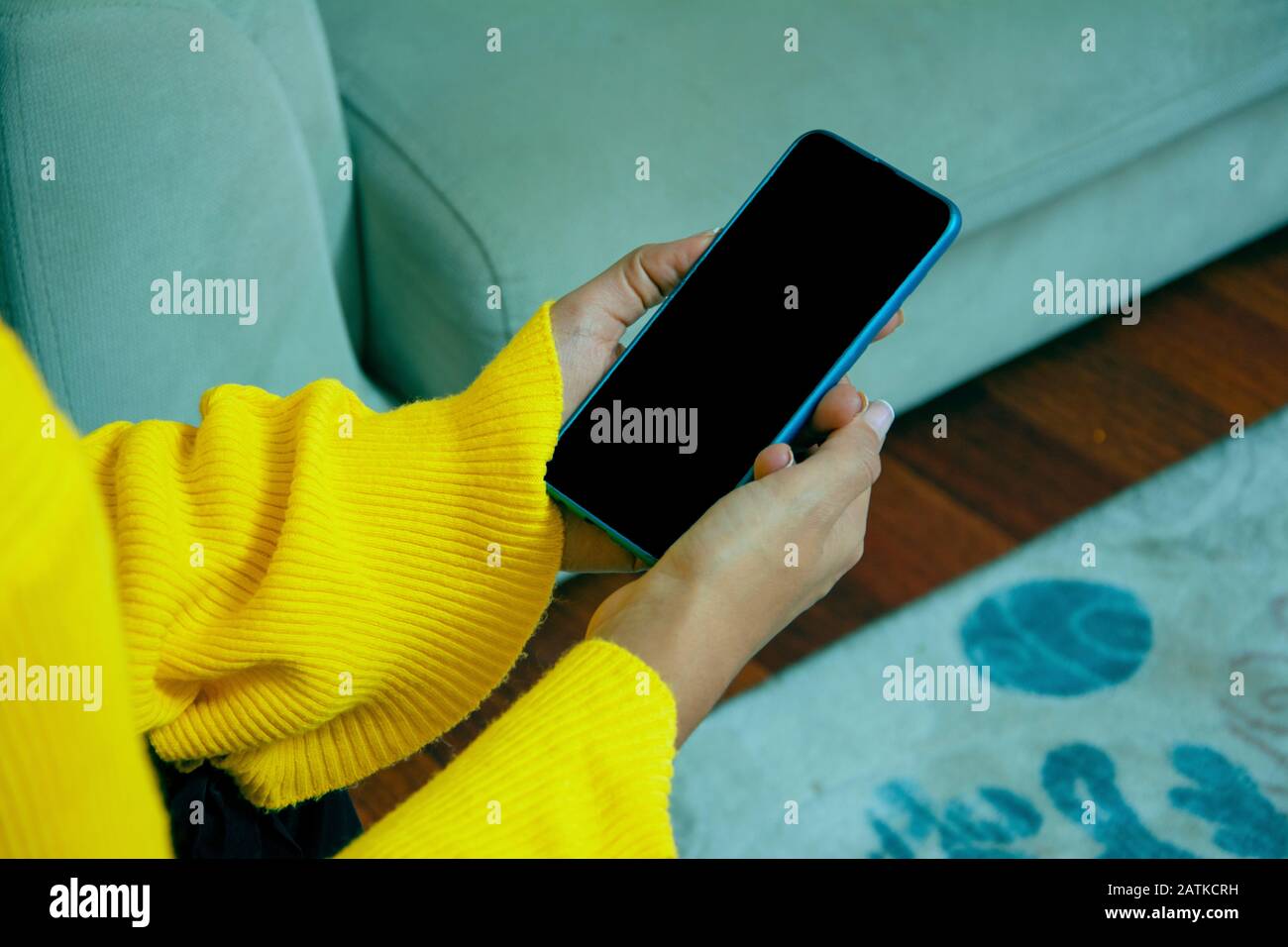 Hand holding phone up in foreground hi-res stock photography and images ...