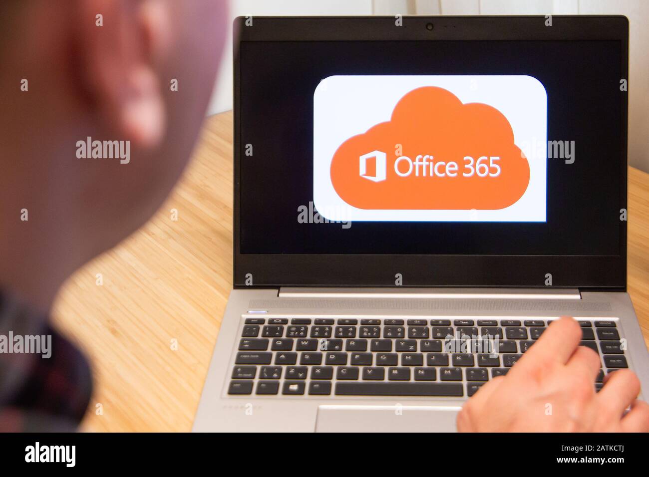 Office 365 is used by a man on the laptop. Microsoft customer used computer software. New product is tested by IT specialist. San Francisco, February Stock Photo