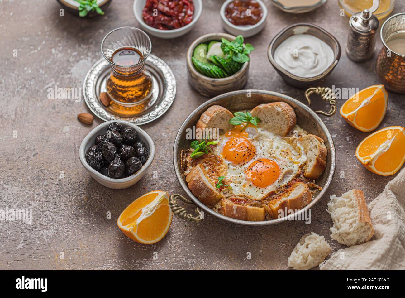 turkish-breakfast-with-fried-eggs-cheese-vegetables-yoghurt-and
