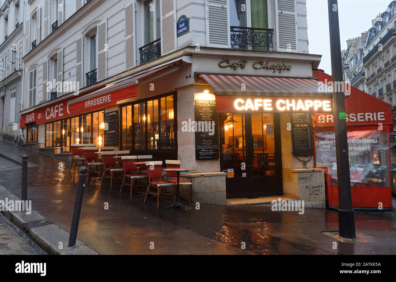 Cafe Chappe at rainy morning . It is a traditional French cafe in the Montmartre district, Paris, France. Stock Photo