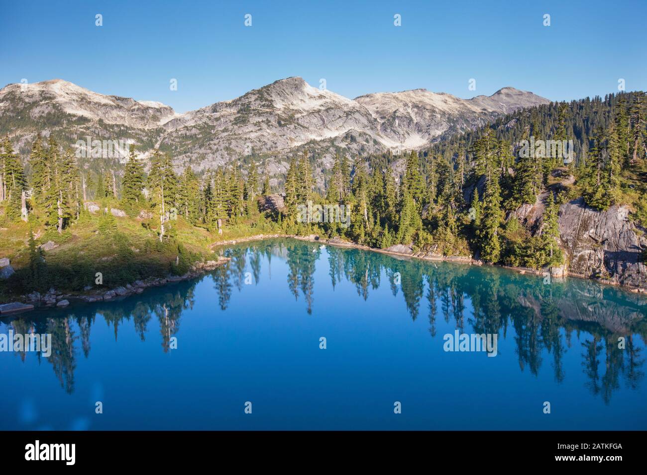 Turquoise blue alpine lake near Vancouver, B.C. Stock Photo