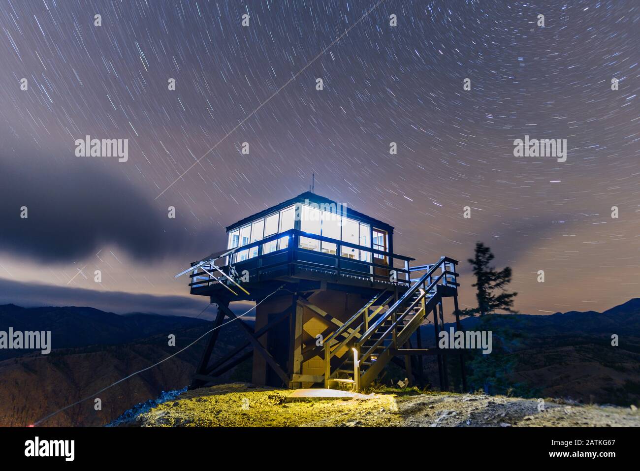 Fire Lookout Tower At Night With Stars Stock Photo