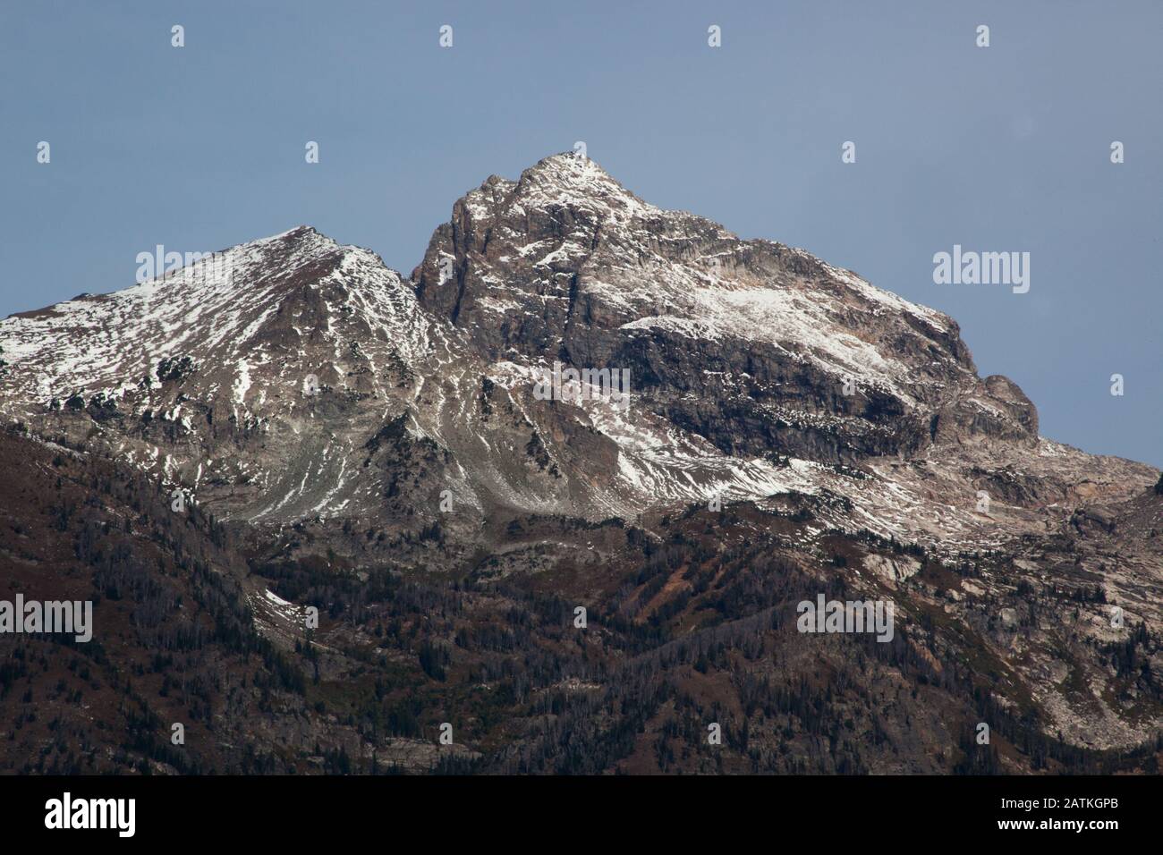 Snow Capped Mountain with clouds Stock Photo - Alamy