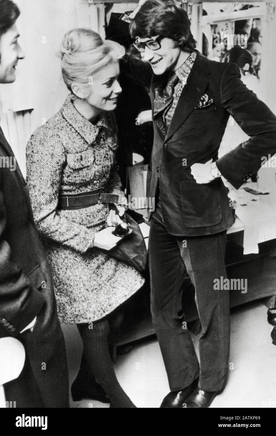 Catherine Deneuve and Yves Saint-Laurent backstage at one of Saint-  Laurent's fashion shows, in Paris. (January 30th, 1968) Cinema Legacy  Collection File Reference # 33962-030THA Stock Photo - Alamy